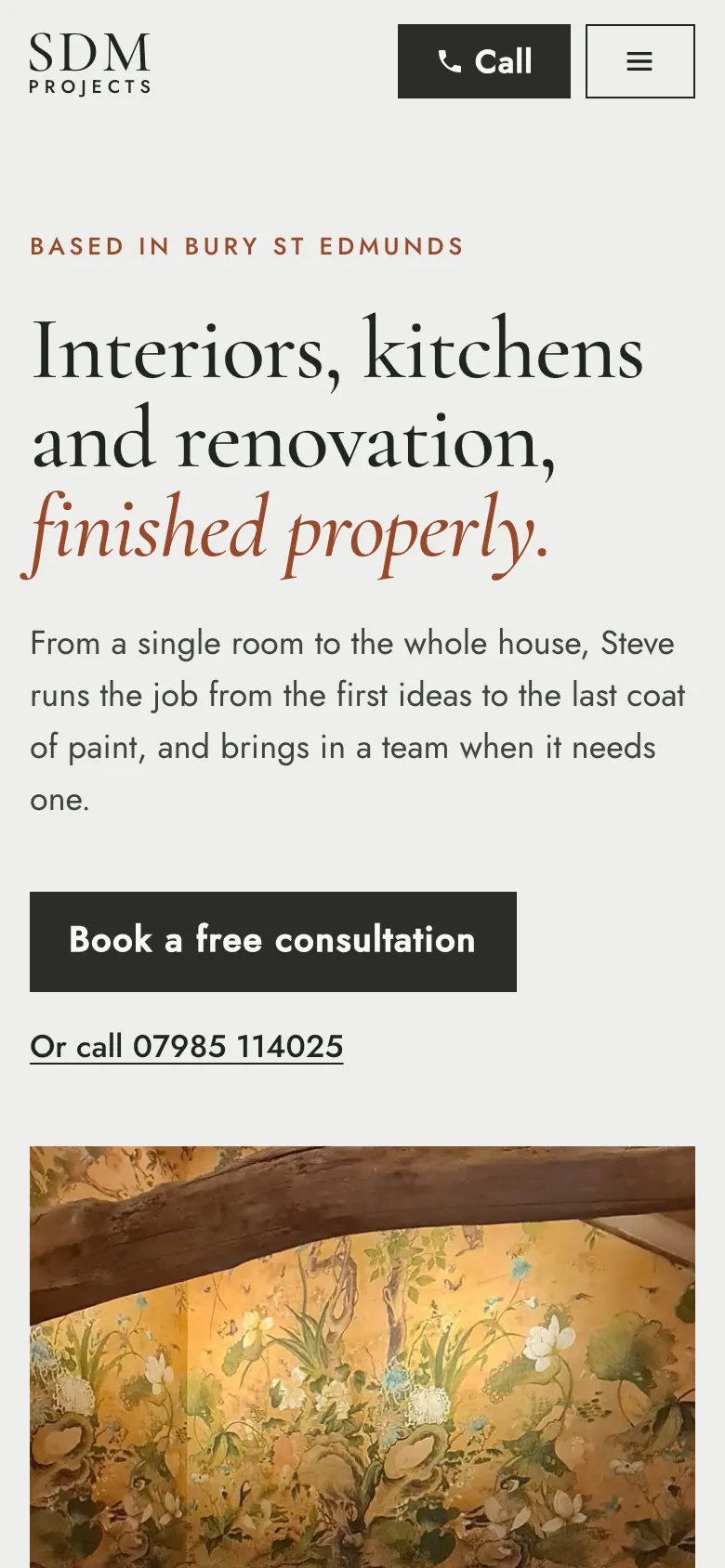 The SDM Projects home page on a phone, with the call button at the top.